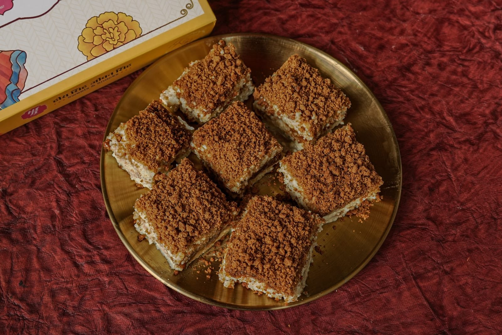 Biscoff barfi squares finished with a crumb topping