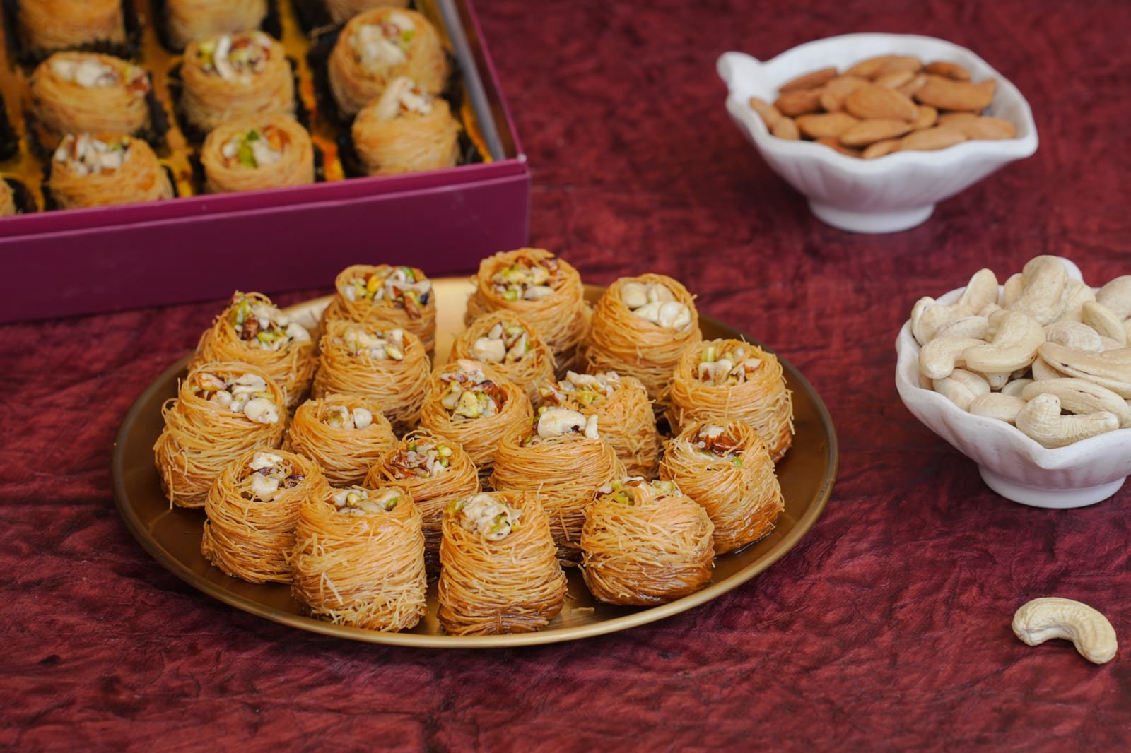 Baklava nests of shredded pastry filled with chopped pistachio